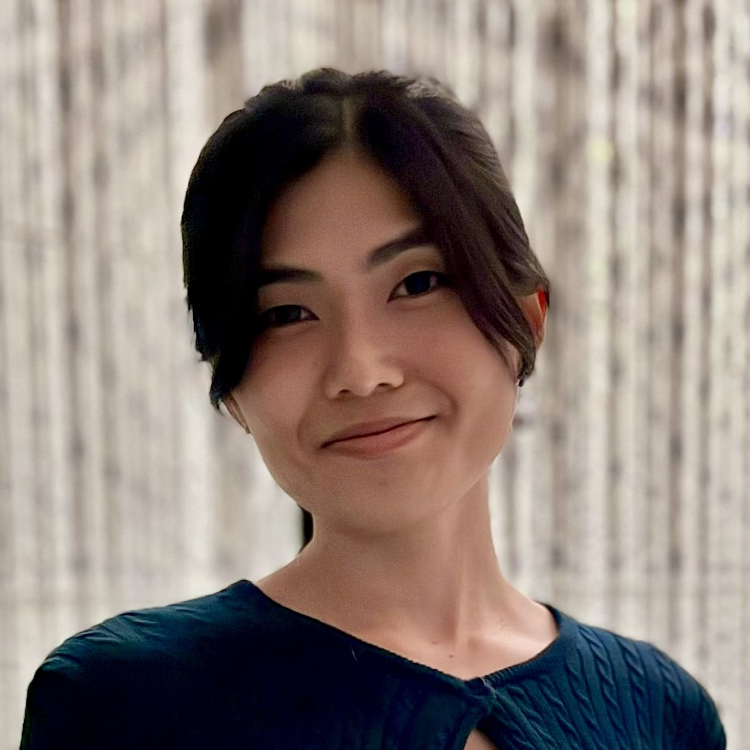 Anna Kawakami smiling.