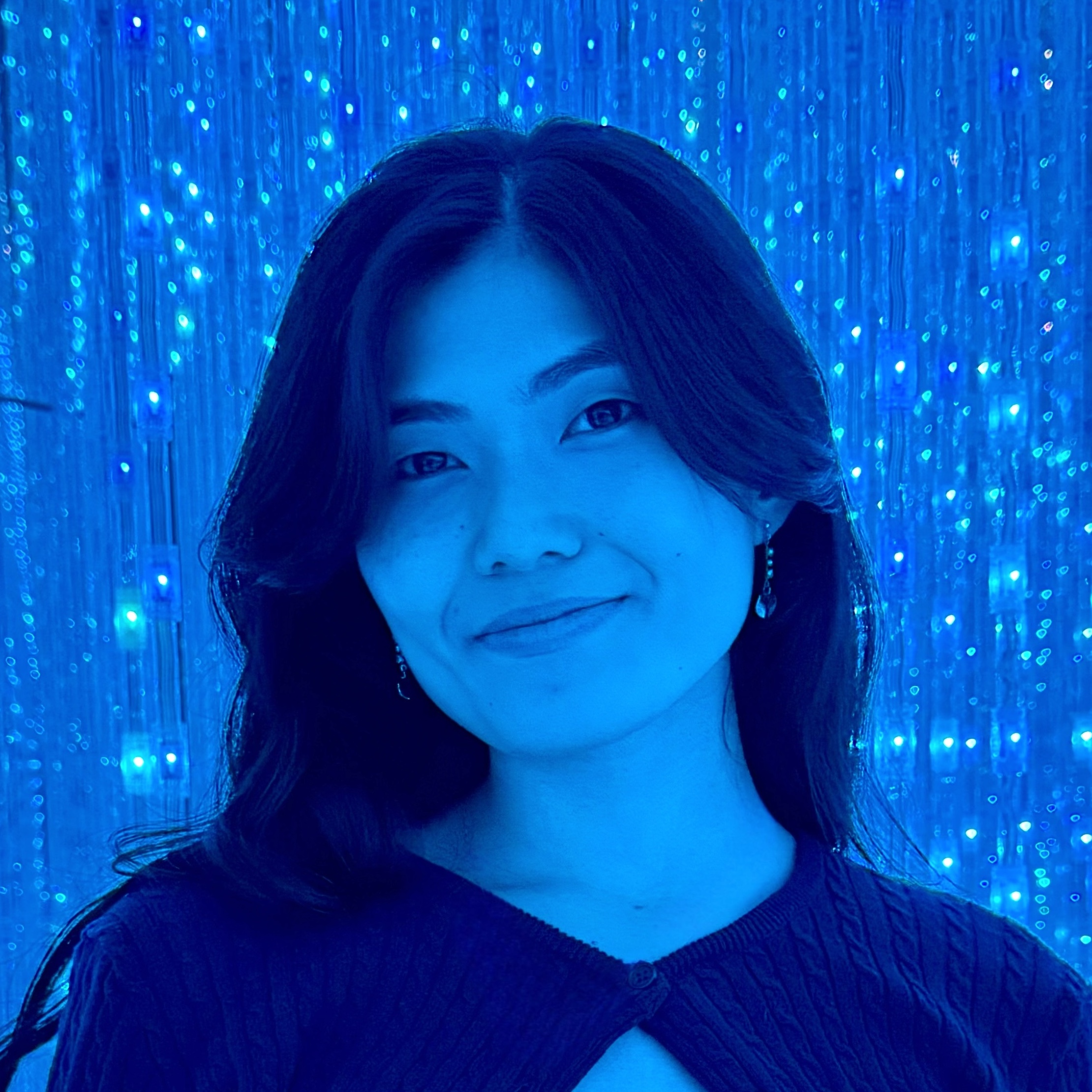 Anna Kawakami smiling.